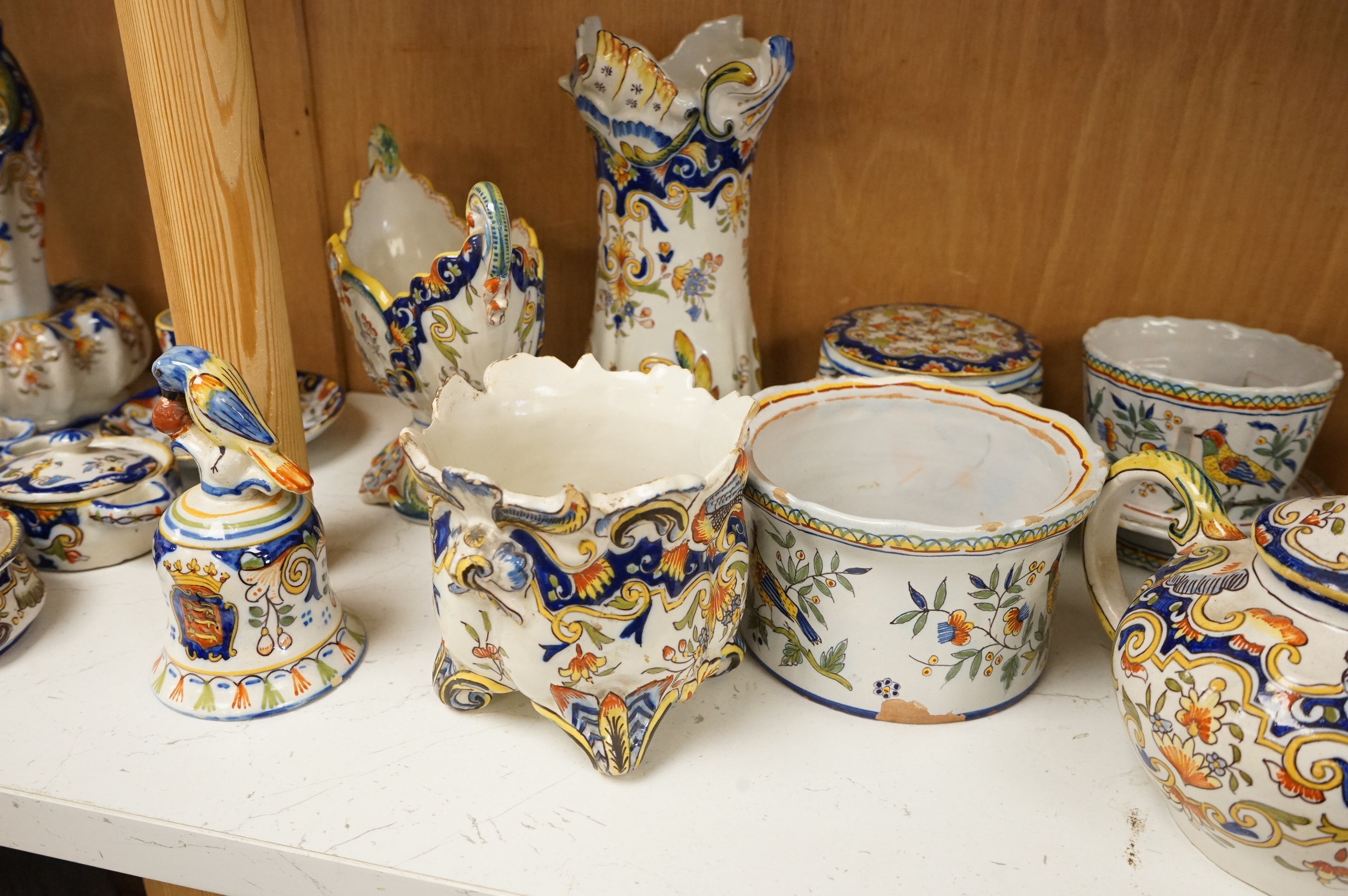 A group of French faience pottery to include trinket boxes, a teapot and vases, largest 32cm in length